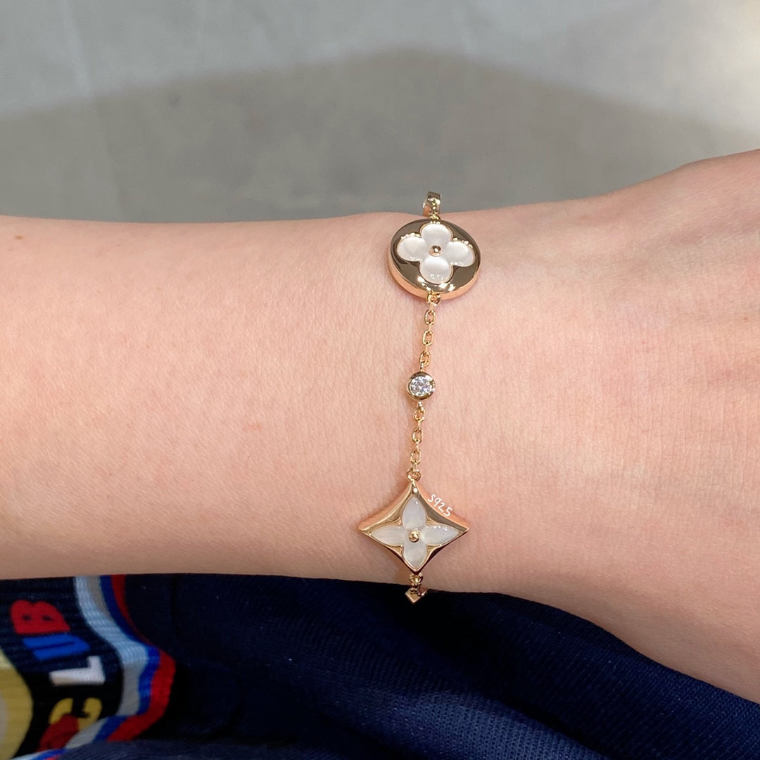 [baslovejewels]STAR AND SUN 4 MOTIF WHITE MOP PINK GOLD BRACELET